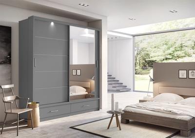 Modern bedroom with gray wardrobe and bed