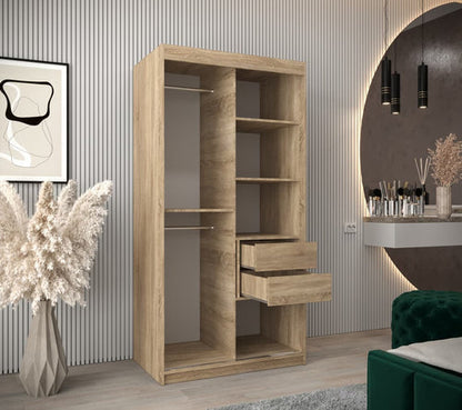 Wooden bookshelf with shelves and drawers in a room with decorative elements.