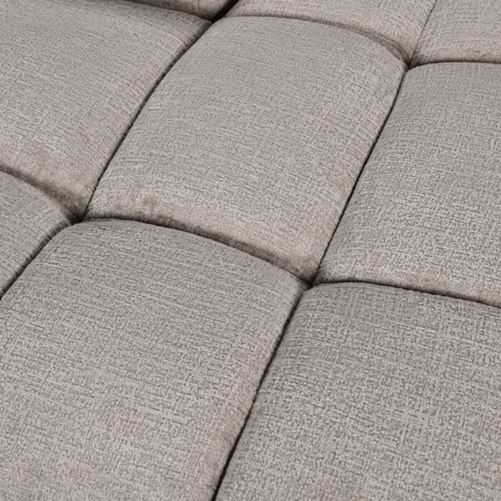 Close-up of a textured gray cushioned surface