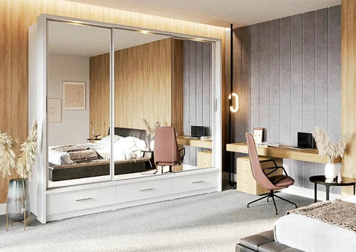 Modern bedroom with a large mirror wardrobe, desk, and chair.