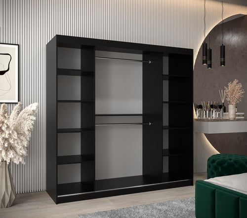 Black wardrobe in a modern room with decor elements