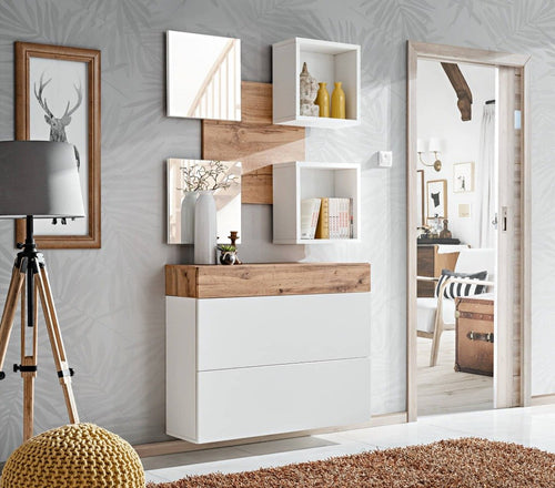 Modern interior design with white wall-mounted shelves, wooden accents, and decor items.