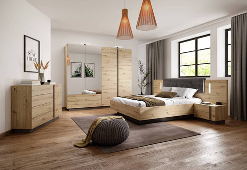Modern bedroom with wooden furniture including a bed, dresser, and mirror.