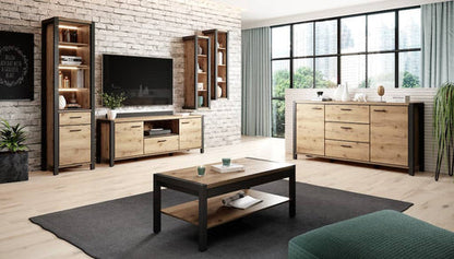 Modern living room with wooden furniture, TV, and large windows.