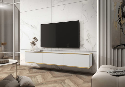 Modern living room with a white entertainment console and TV against a marble wall.