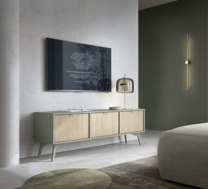 Modern living room with a television mounted on a wall, a sideboard, and a lamp.