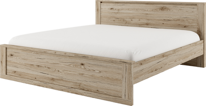 Wooden bed frame with white mattress on a white background