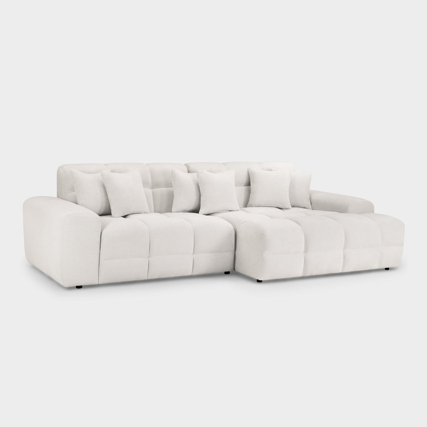 White sectional sofa on a light gray background