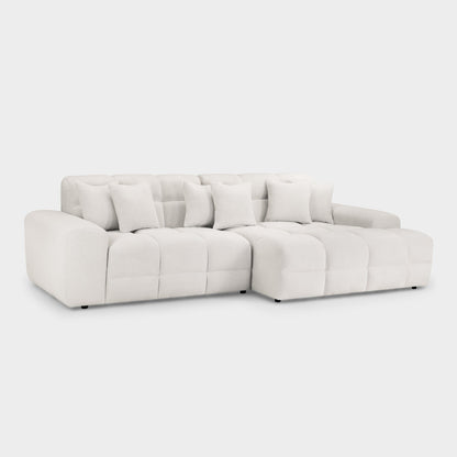 White sectional sofa on a light gray background
