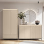 Modern interior with a beige wardrobe and sideboard against a light gray wall.