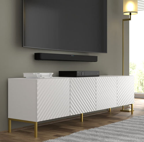 White textured entertainment console with TV and soundbar in a living room setting