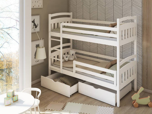 White bunk bed with pull-out drawers in a room with a window and toys on the floor.