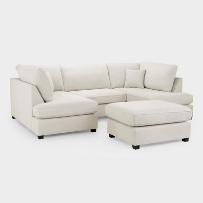 Beige sectional sofa with ottoman on a white background