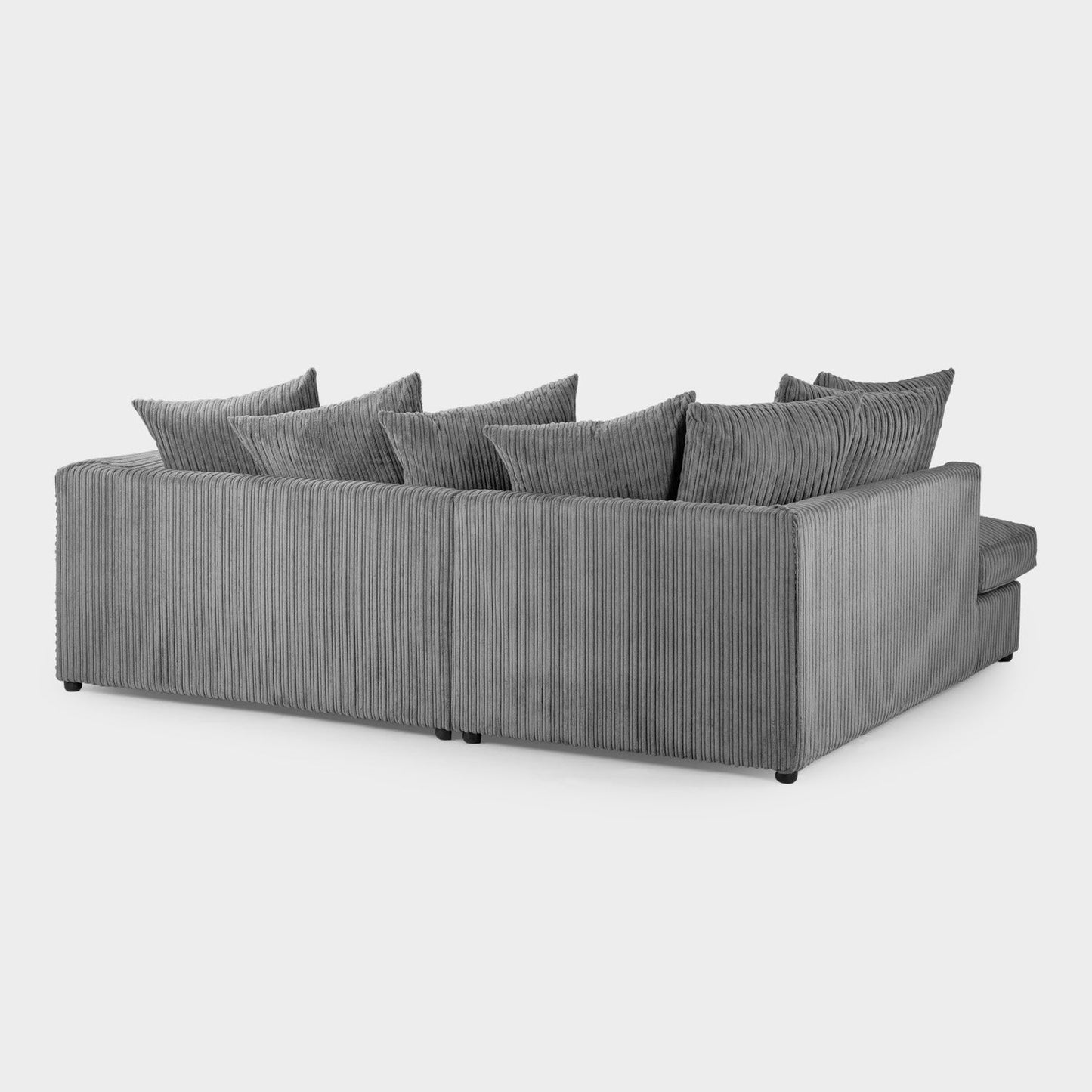 Gray sectional sofa with multiple cushions on a white background