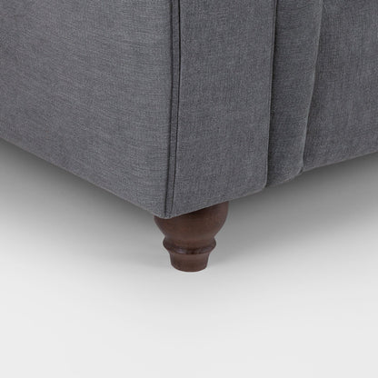 Gray upholstered furniture with wooden leg on a white background