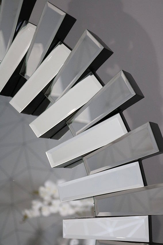 Modern white radiator against a gray wall