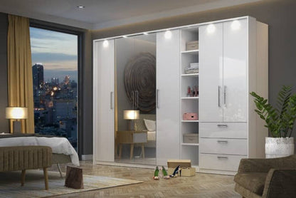Modern bedroom with a large white wardrobe, bed, and cityscape view.